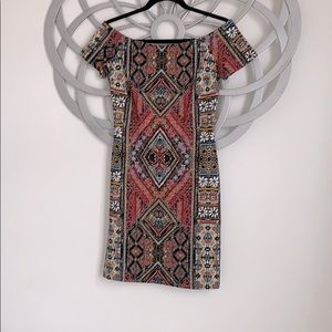 Multicolored off shoulder dress.